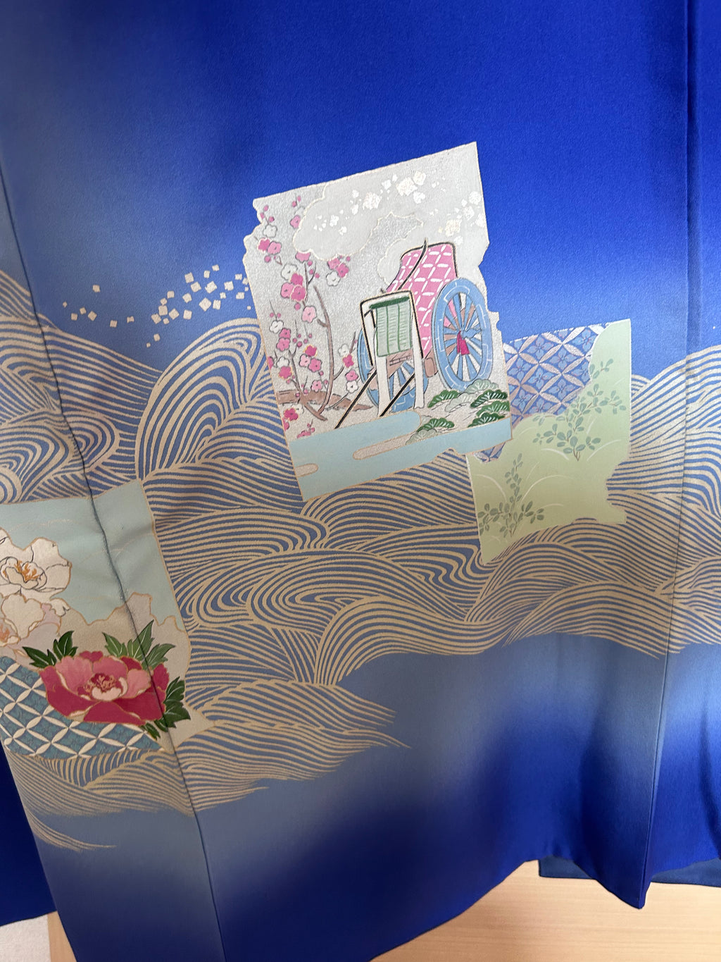 Close-up of traditional Japanese floral and wave motifs on vintage silk haori -2