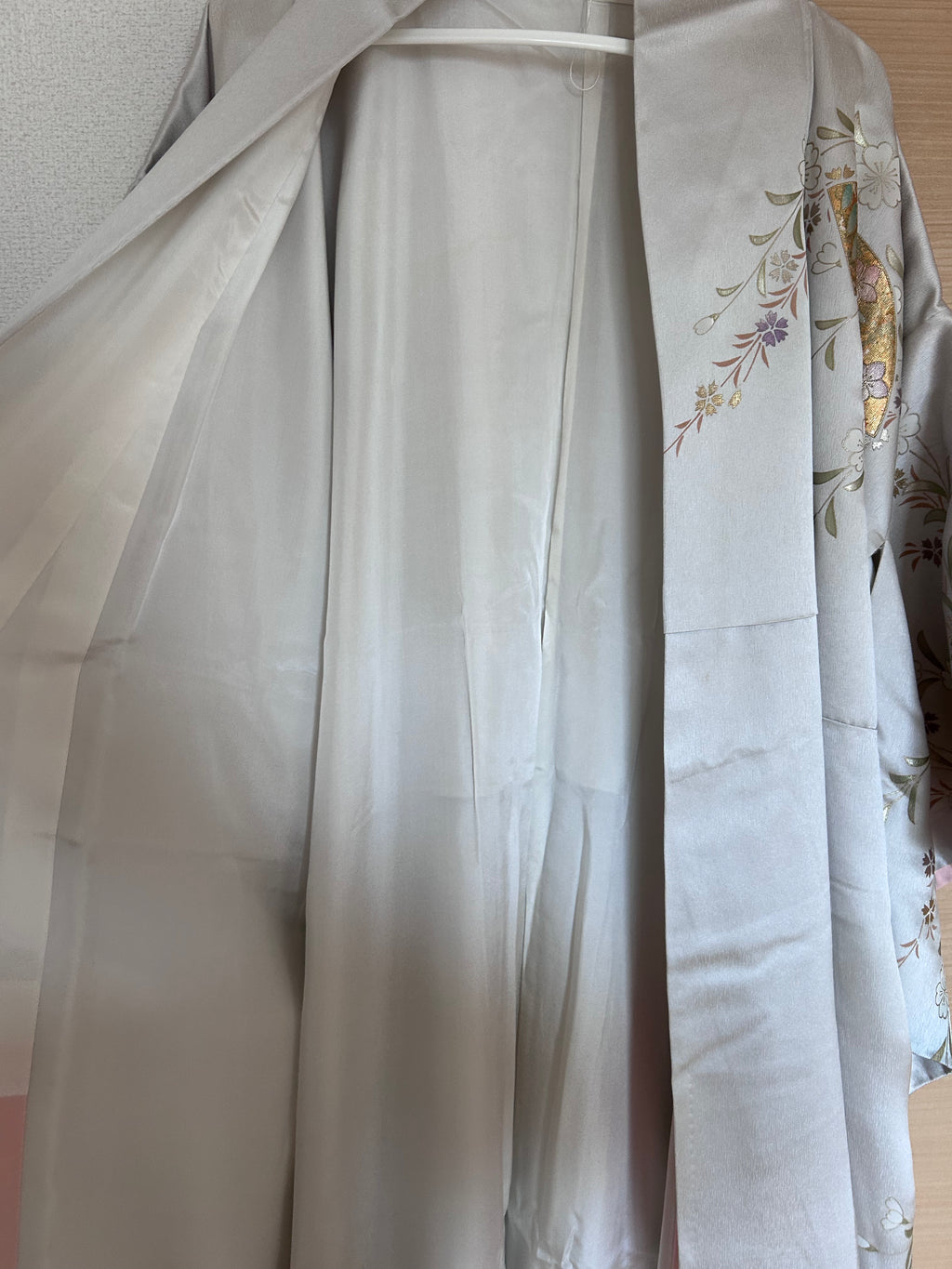 Vintage Japanese silk haori in soft silver with sakura and fan motifs - front view zoom